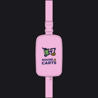 A pink waist bag with an adjustable strap, featuring a printed graphic of a green trash can, a yellow '10' coin, and the text 'HOUSE OF CARTS' on the front.