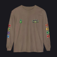 A brown long-sleeve t-shirt with 'HOC SLOTS' printed on the left chest, a green emblem on the right chest, and colorful game-piece graphics printed down both sleeves.