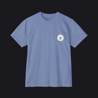 A light blue crewneck pocket t-shirt with a small white circular chest graphic showing a power plug icon, displayed on a clean white background.