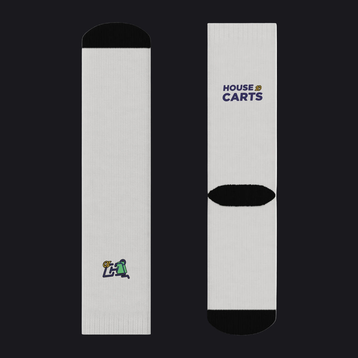 A pair of white crew socks shown from both the front and back views against a plain white background. The front view features a small multicolor logo near the foot, while the back view features the 'HOUSE OF CARTS' logo in navy blue and gold near the calf, with a black ribbed heel and toe.