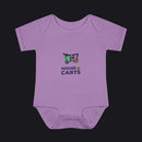A lavender purple short-sleeve baby bodysuit with a colorful graphic on the chest showing a shopping cart and the text 'HOUSE OF CARTS'.