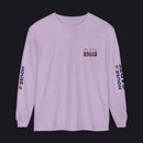 A light purple long-sleeve t-shirt with a small chest graphic and military-style ribbons, featuring 'HOUSE CARDS' printed vertically on both sleeves.