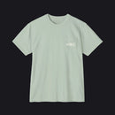 Light green t-shirt with text on a white background