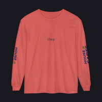 A coral pink long-sleeve t-shirt with 'tlrep' printed in black on the chest and 'HOUSE OF CARDS' printed vertically in blue and yellow on both sleeves, shown on a plain white background.