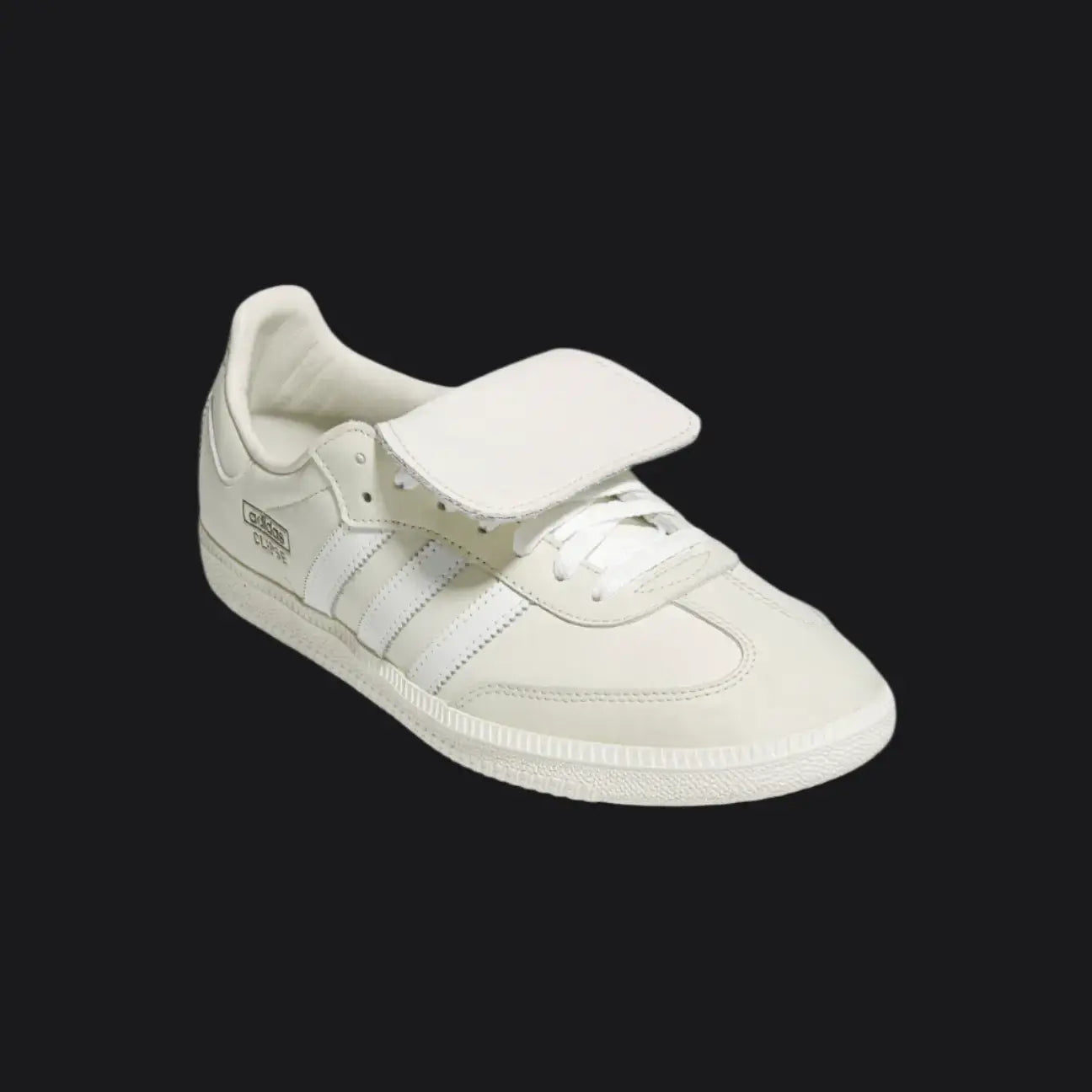 White sneaker with velcro straps on a white background